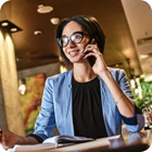 woman on phone call at her desk